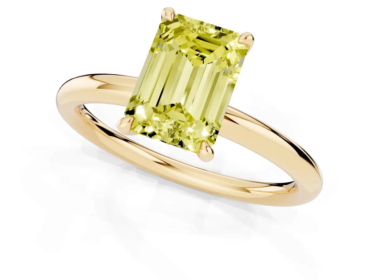 Fancy Yellow Emerald Cut Diamond Solitaire Ring with Thin Band and Four-Prong Setting Yellow gold