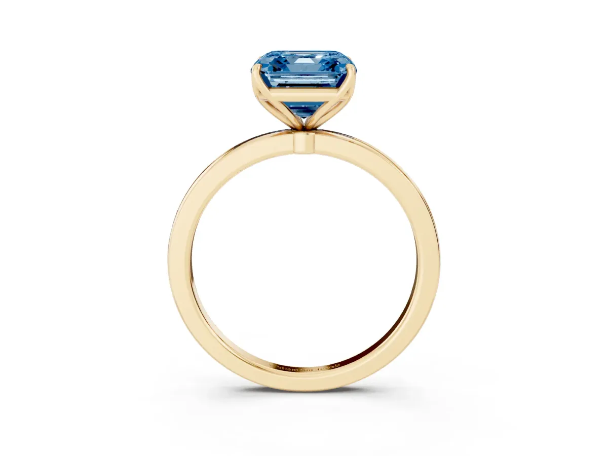 Fancy Blue Asscher Cut Diamond Solitaire Ring with Thin Band and Prong Setting Yellow gold