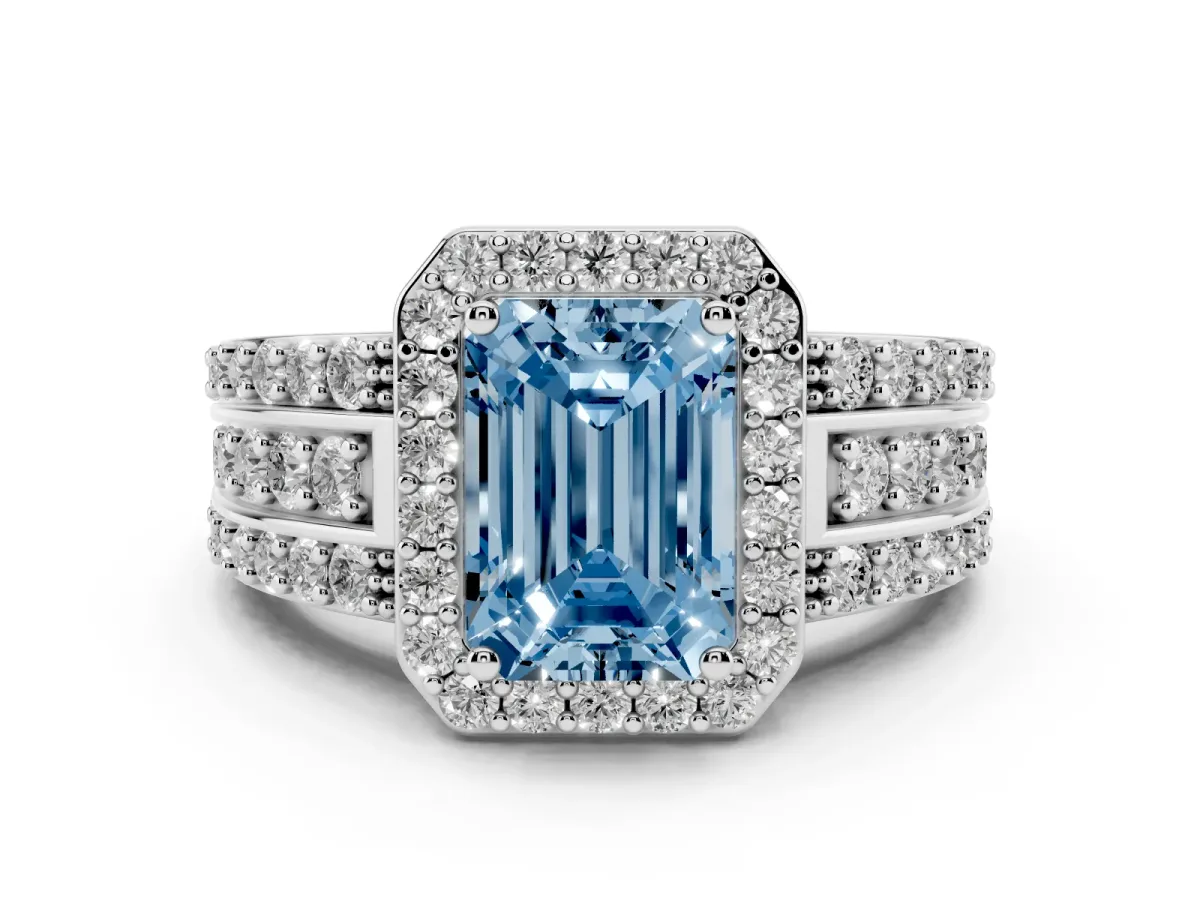 Fancy Blue Emerald Cut Halo Diamond Ring with Round Split Shank and Prong Setting Platinum