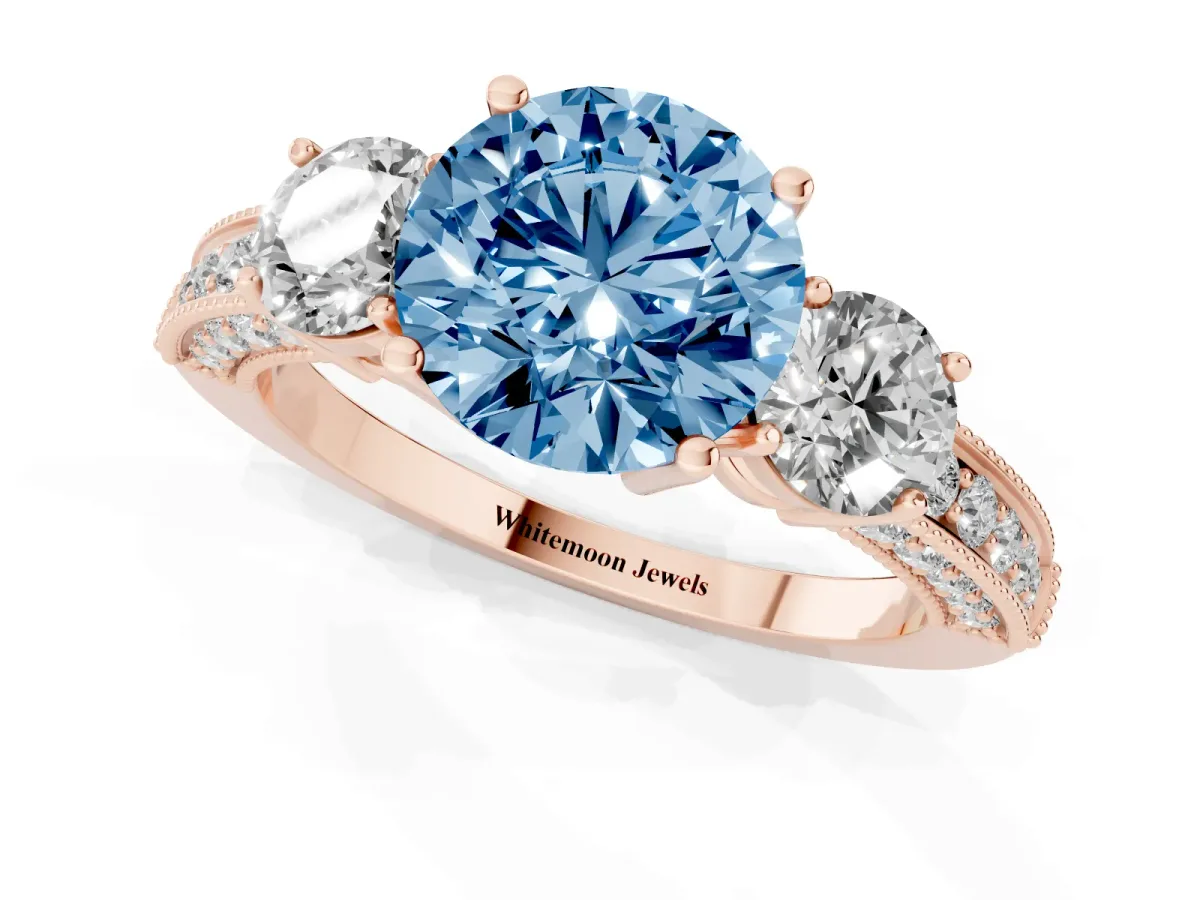 Fancy Blue Round Cut Three-Stone Diamond Ring with Pavé Band and Four-Prong Setting Rose gold