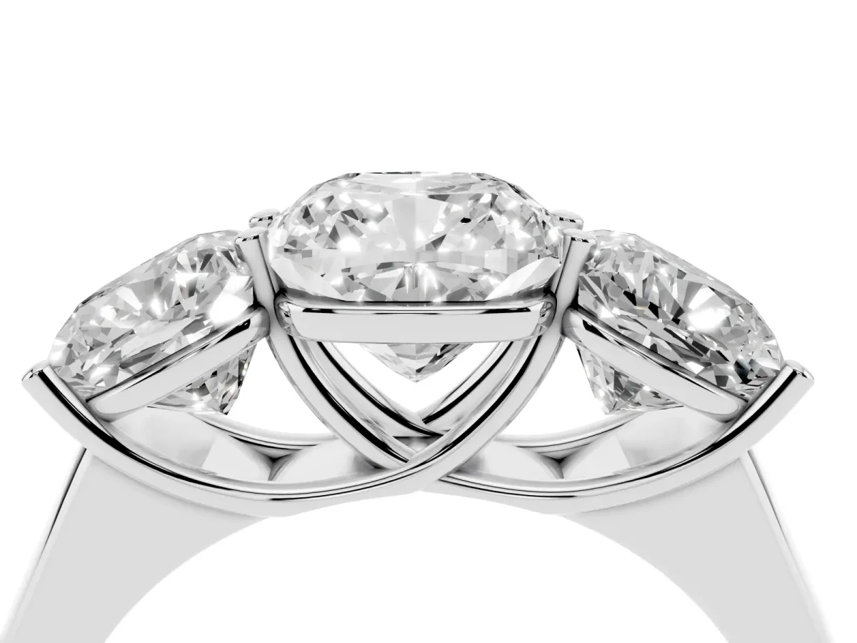 Cushion Cut Three-Stone Diamond Ring with Prong Setting on a Classic Band Silver