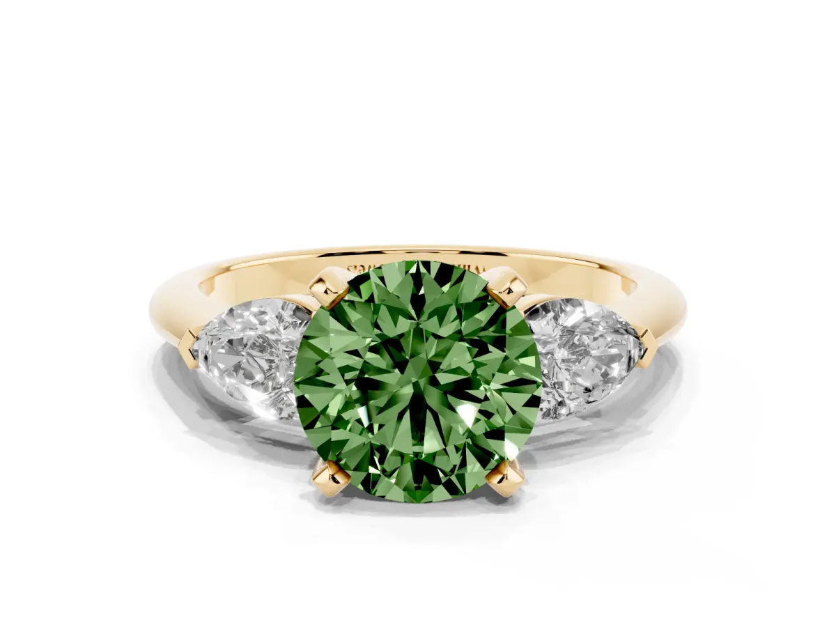 Fancy Green Three-Stone Round Cut Diamond Ring with Pear Side Stones and Four-Prong Setting Yellow gold
