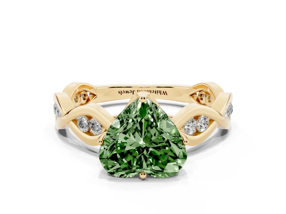 Fancy Green Heart Cut Solitaire Twist Band with Leaf Prong Setting Yellow gold