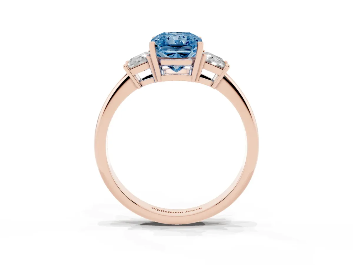 Fancy Blue Radiant Cut Diamond Three-Stone Ring with Trapezoid Side Stones and Prong Setting Rose gold
