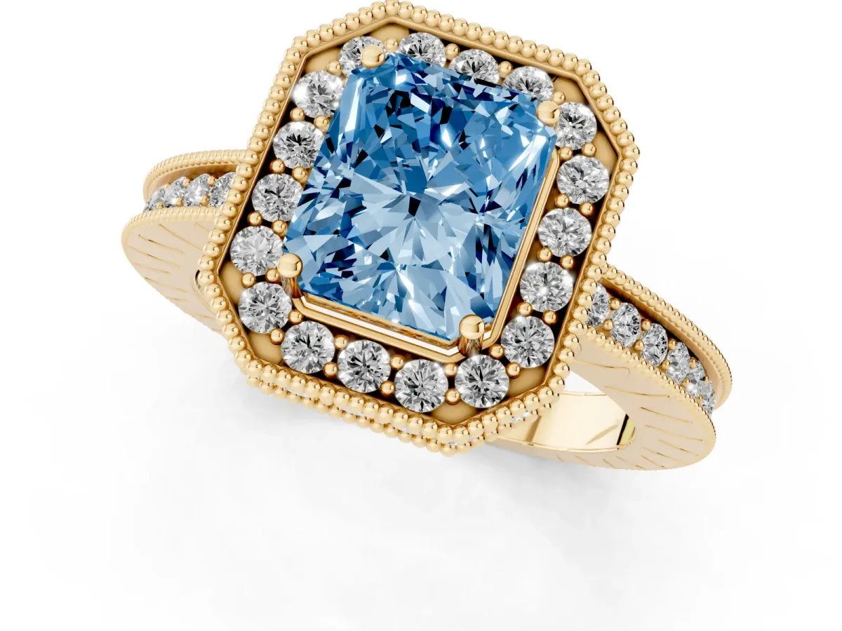 Fancy Blue Radiant Cut Diamond Milgrain Halo Engagement Ring with Round Pavé Band and Prong Setting Yellow gold