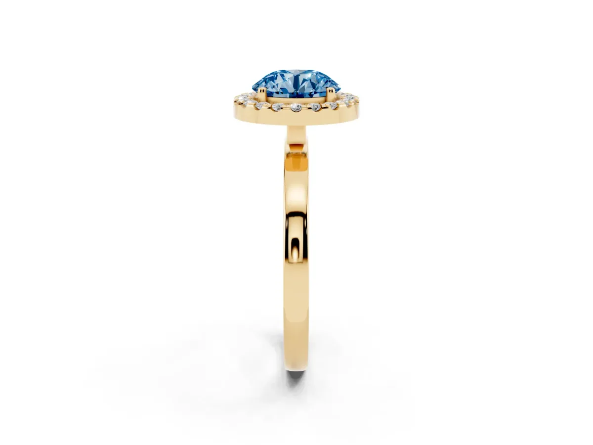 Fancy Blue Round Cut Halo Diamond Solitaire with Pavé Band and Four-Prong Setting Yellow gold