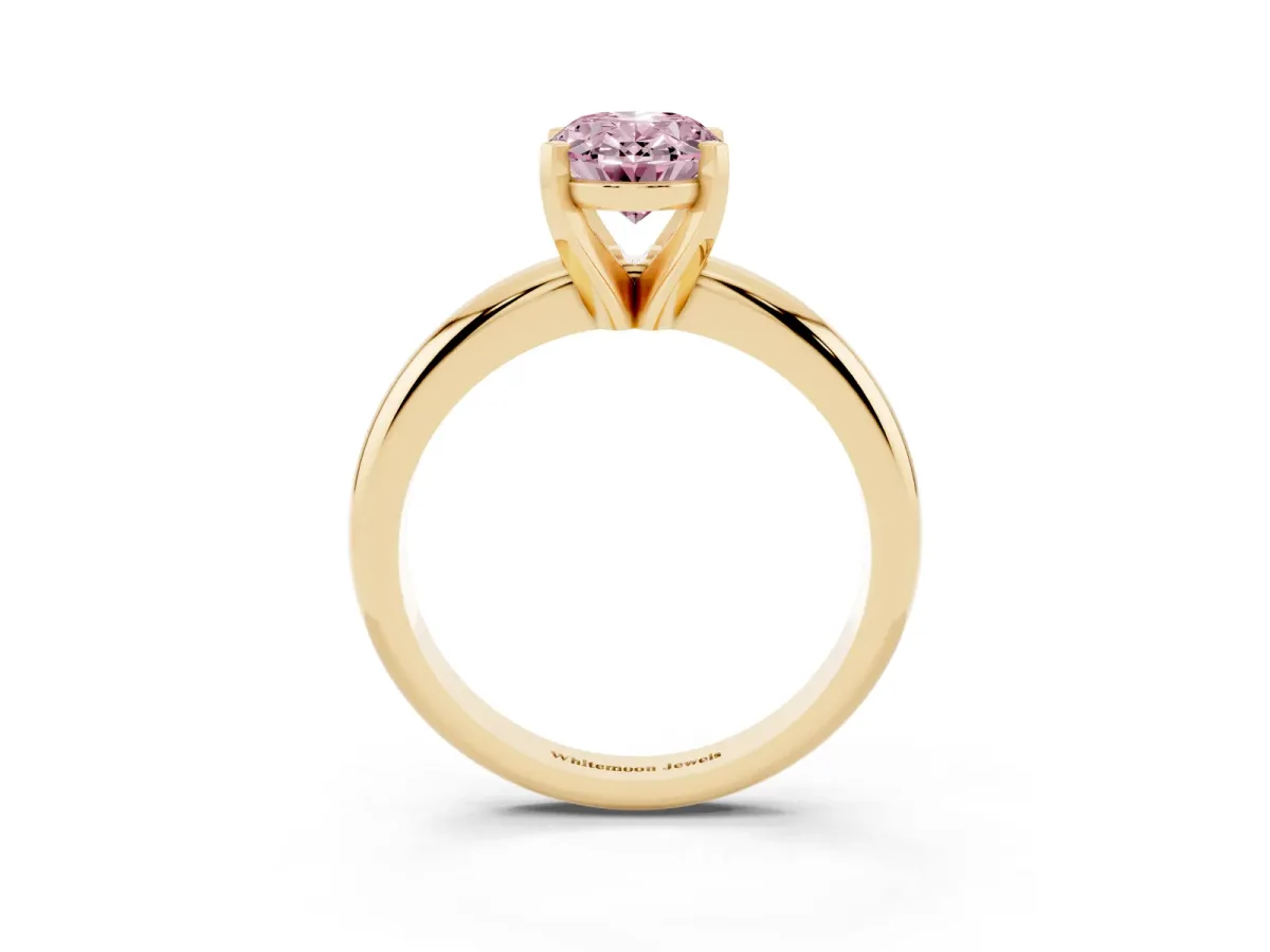 Fancy Pink Oval Cut Diamond Solitaire Engagement Ring with Round Band and Four-Prong Setting Yellow gold