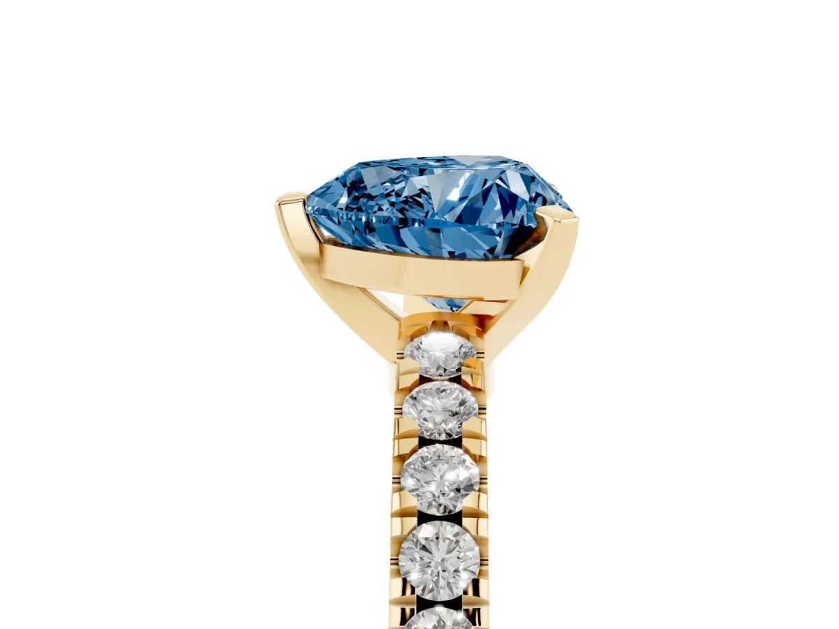 Fancy Blue Heart Cut Solitaire Diamond with Pavé Band and Four-Prong Setting Yellow gold