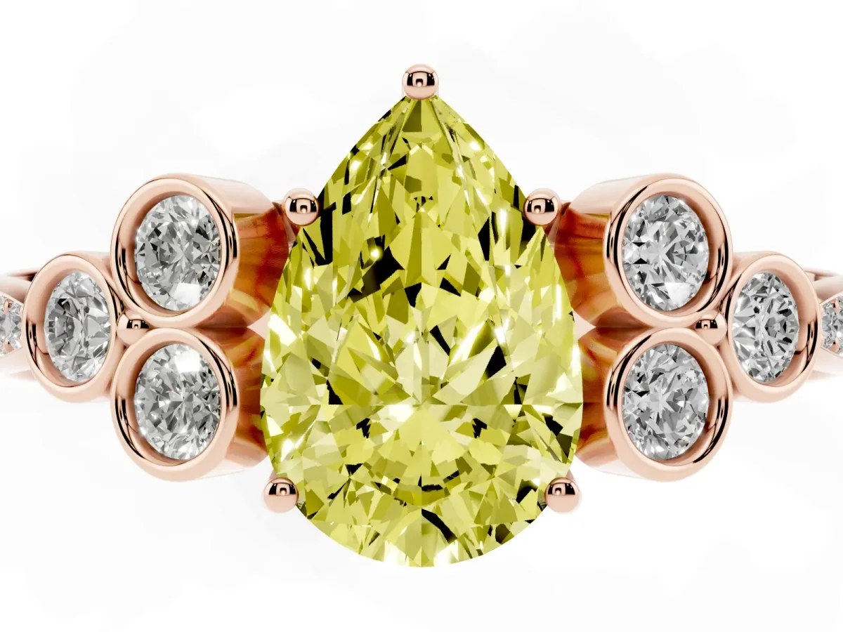 Fancy Yellow Pear Cut Cut Diamond Engagement Ring with Bezel Set Round Side Stones and Prong Setting Rose gold