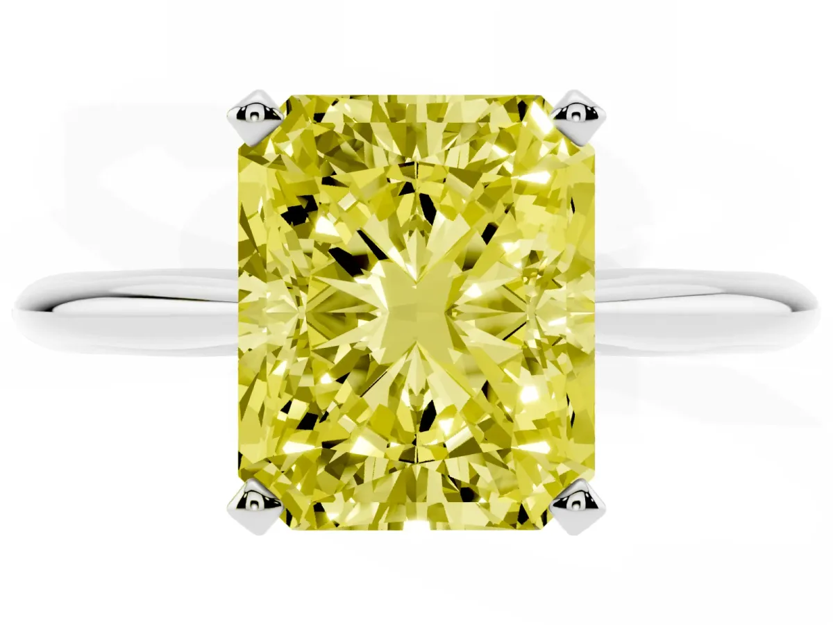 Fancy Yellow Radiant Cut Cut Solitaire Ring with Four-Prong Setting on a Classic Band Silver