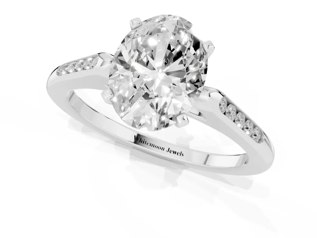 Oval Cut Diamond Solitaire Ring with Channel Set Round Band and Prong Setting Silver