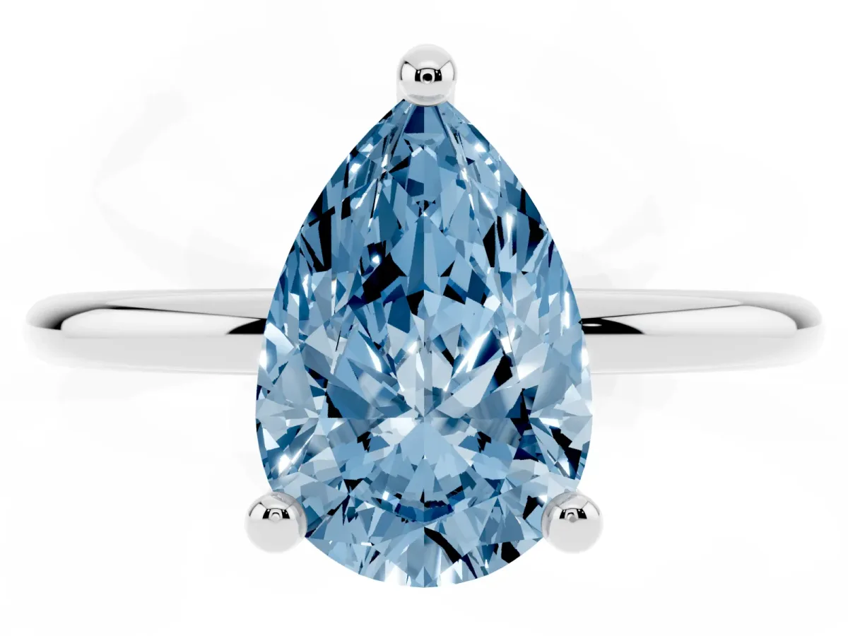Fancy Blue Pear Cut Solitaire Diamond Ring with 4-Prong Setting on a Classic Band Silver