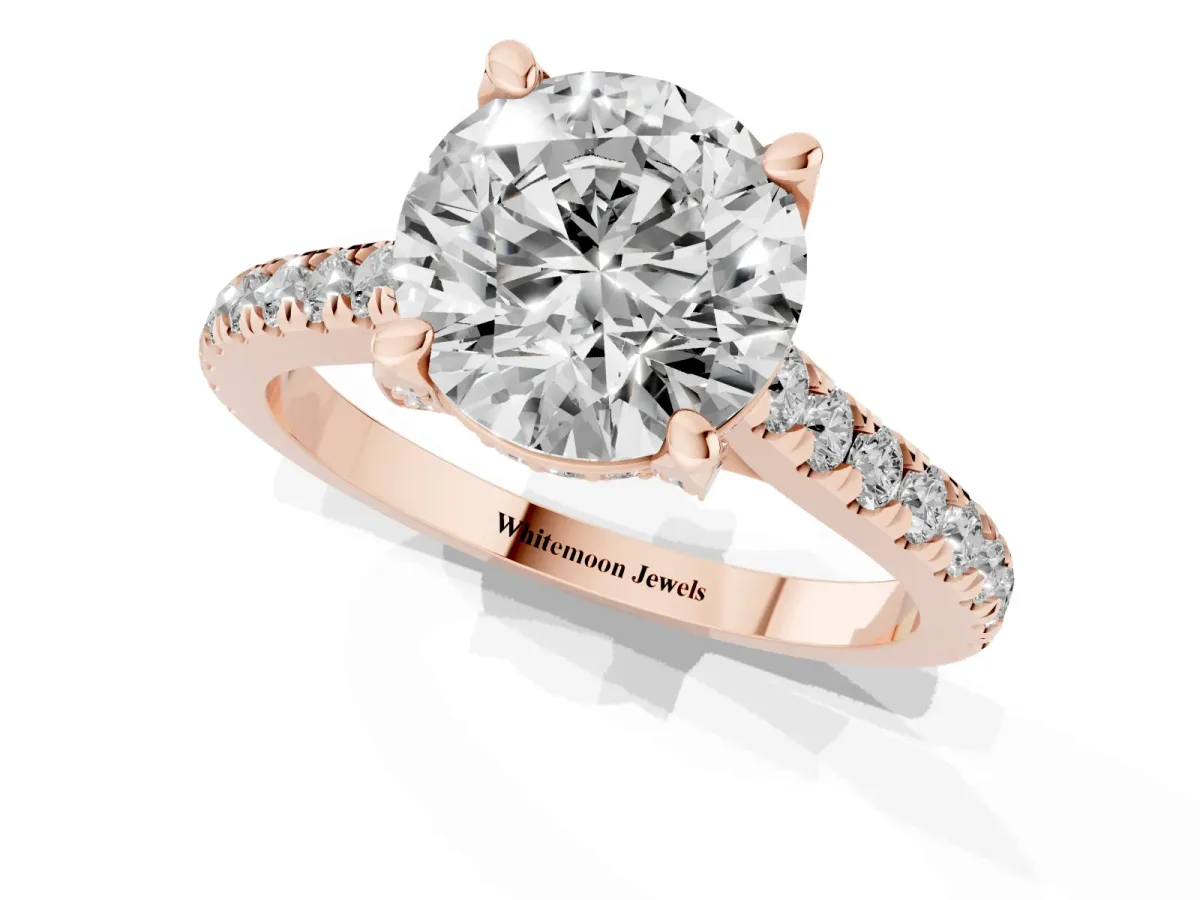 Round Cut Brilliant Diamond Solitaire with Pavé Band and Four-Prong Setting Rose gold