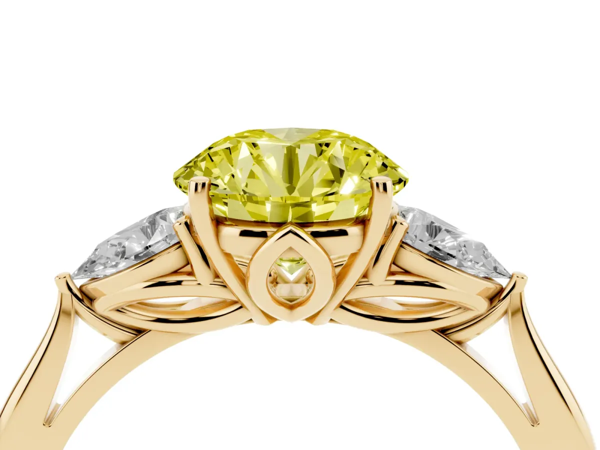 Fancy Yellow Three-Stone Round Cut Diamond Ring with Pear Side Stones in Four-Prong Setting Yellow gold