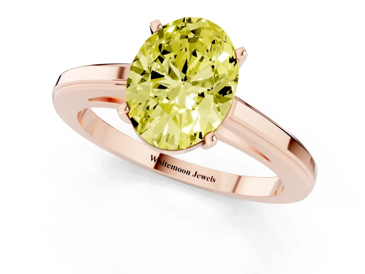 Fancy Yellow Oval Cut Solitaire Diamond Ring with Four-Prong Setting and Classic Band Rose gold