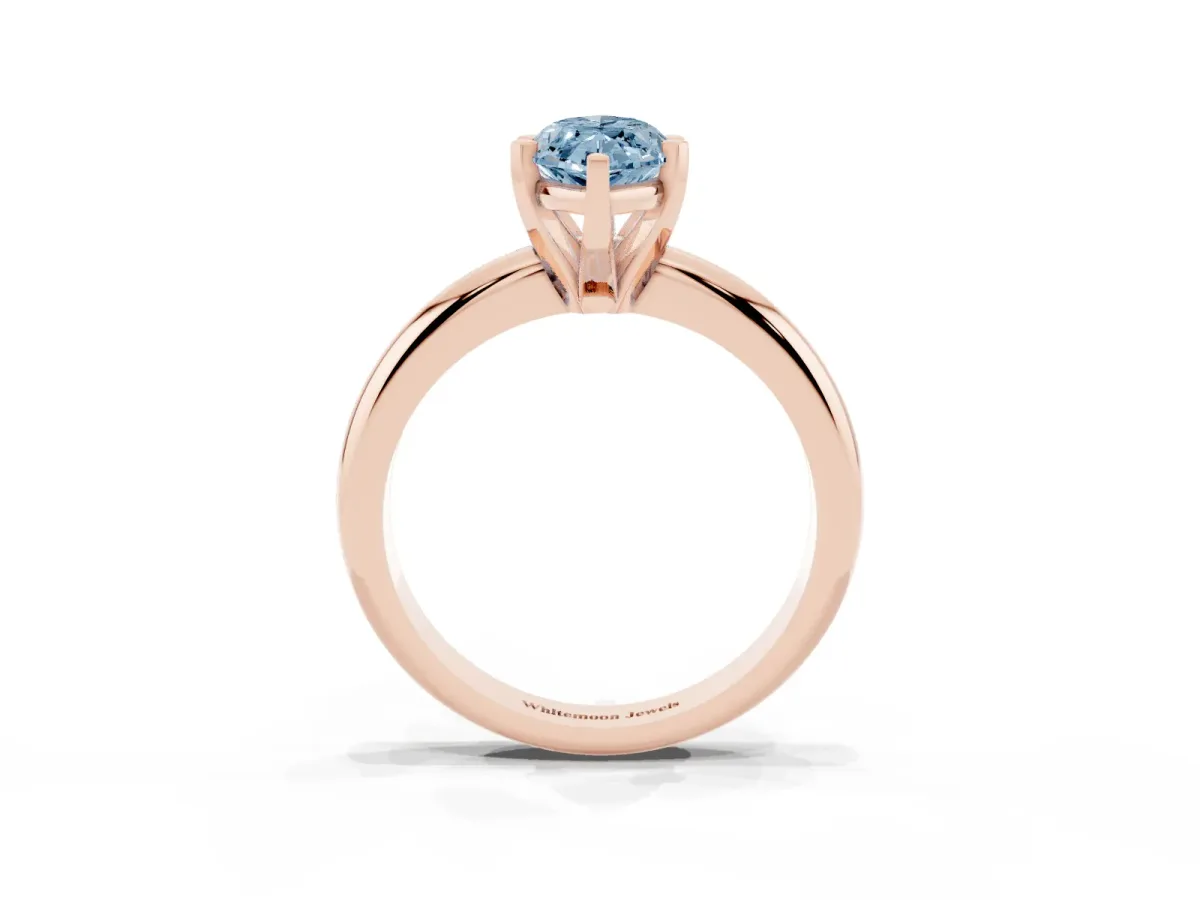 Fancy Blue Marquise Cut Diamond Solitaire Engagement Ring with Round Band and Four-Prong Setting Rose gold
