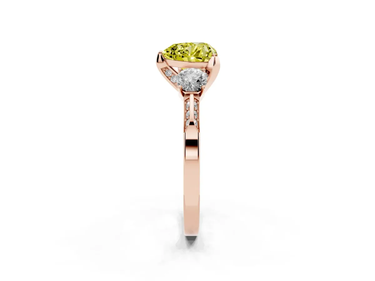 Fancy Yellow Heart Cut Brilliant Three-Stone Diamond Ring with Pavé Band and Four-Prong Setting Rose gold
