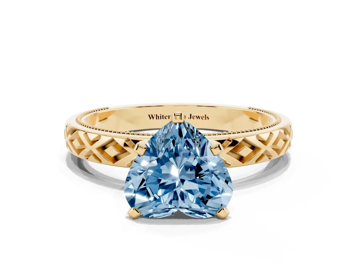 Fancy Blue Heart Cut Solitaire Diamond Ring with Milgrain and Black Enamel X Pattern Band Yellow gold