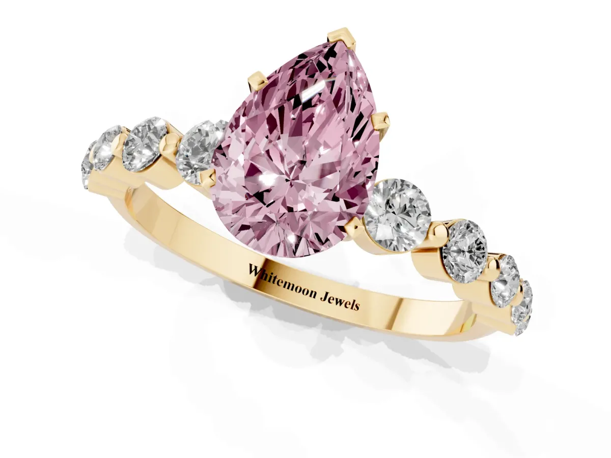 Fancy Pink Pear Cut Solitaire Diamond Ring with Pave Band and Four-Prong Setting Yellow gold