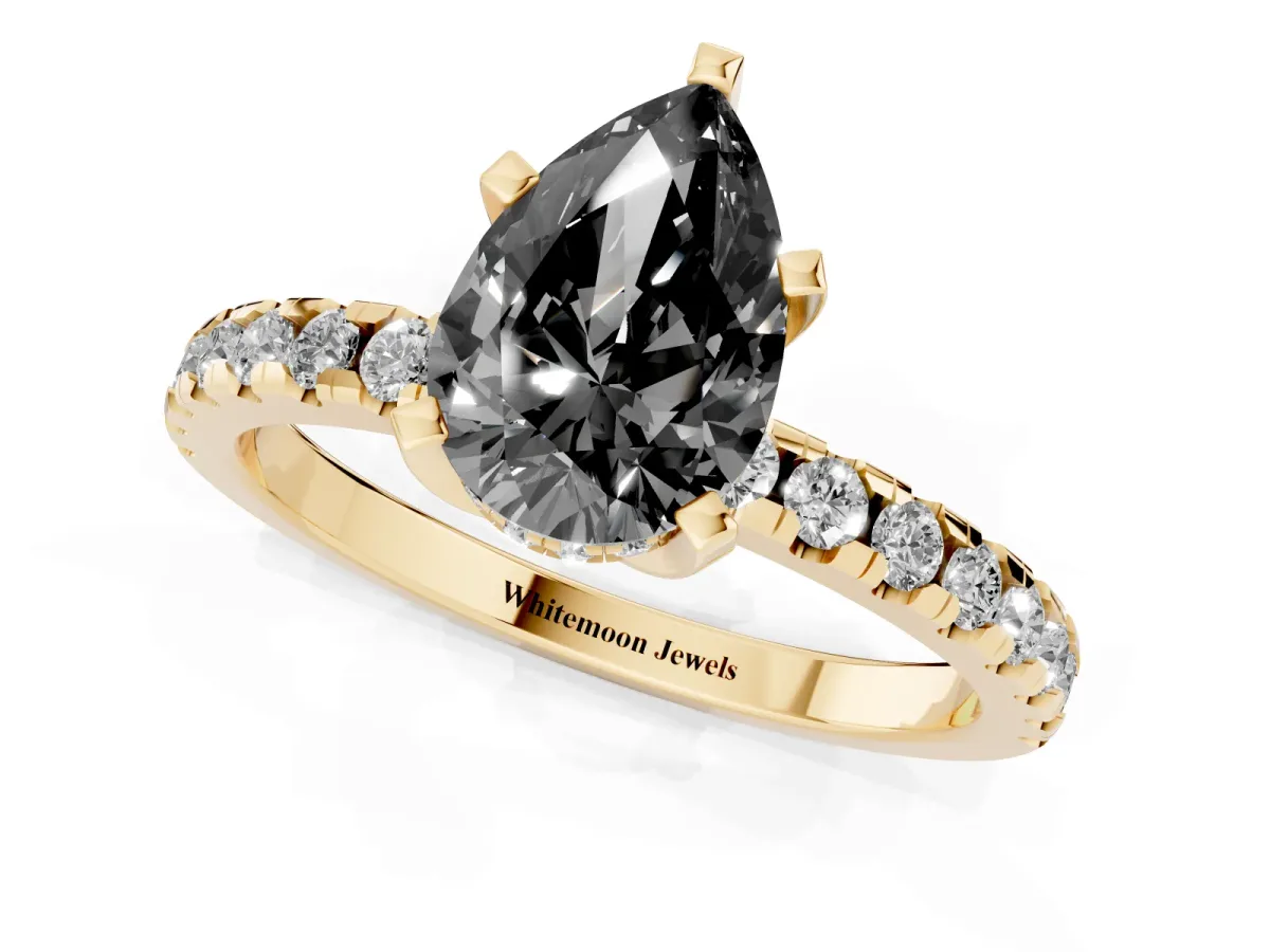 Fancy Black Pear Cut Diamond Solitaire Ring with Round Pavé Band and Four-Prong Setting Yellow gold