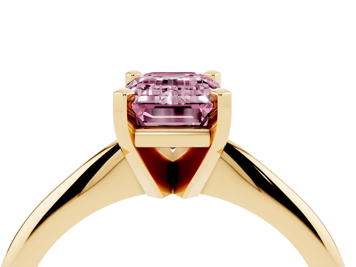 Fancy Pink Emerald Cut Cut Solitaire Ring with Four-Prong Setting on a Classic Band Yellow gold
