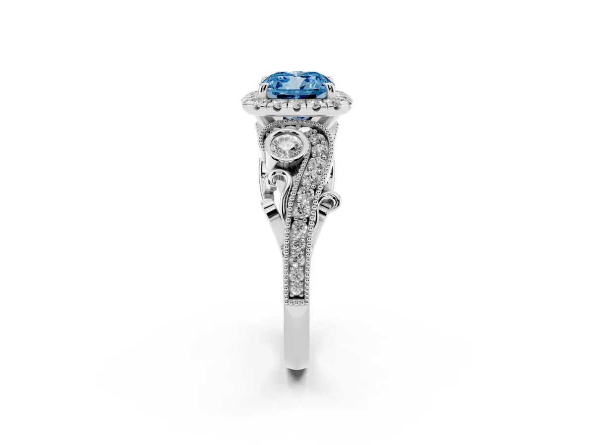 Fancy Blue Cushion Cut Halo Diamond Ring with Milgrain and Bezel Accents on a Split Shank Band White gold