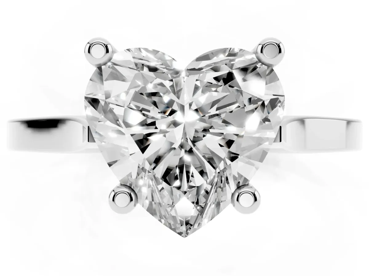 Heart Cut Solitaire Diamond Ring with Four-Prong Setting and Tapered Band Silver
