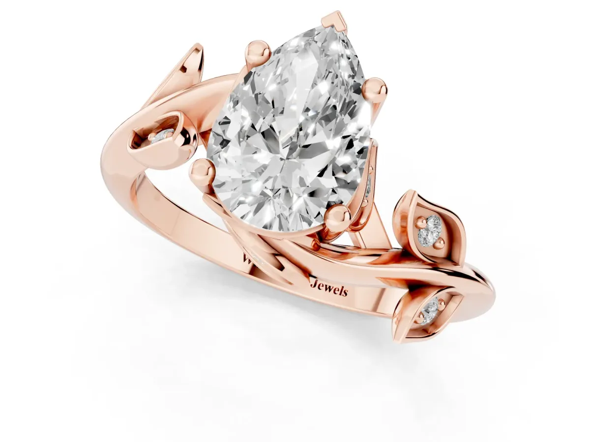 Pear Cut Solitaire Twist Engagement Ring with Leaf Accents and Prong Setting Rose gold