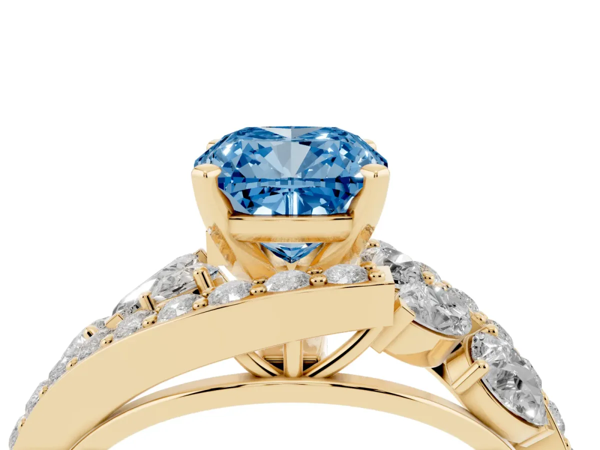 Fancy Blue Cushion Cut Diamond Halo Ring with Marquise and Pavé Band in Prong Setting Yellow gold