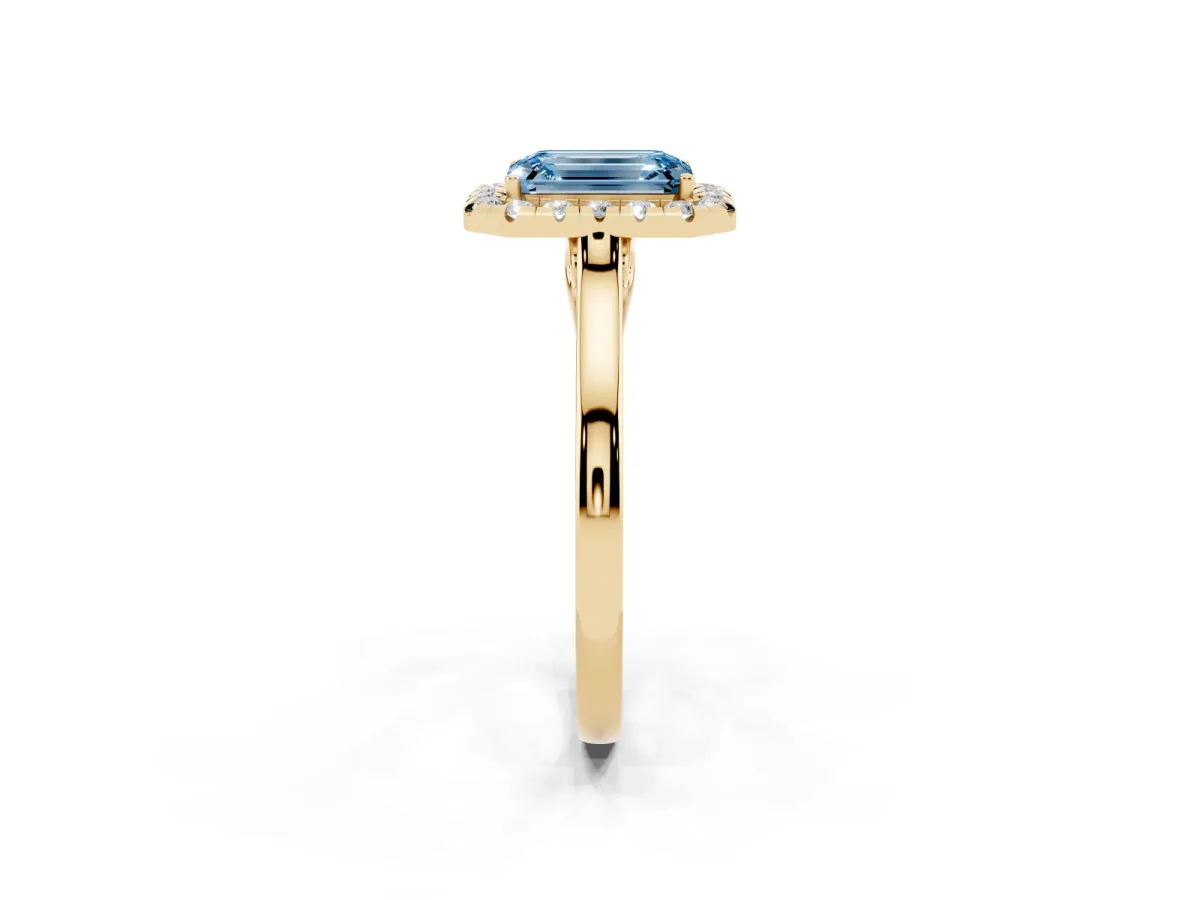 Fancy Blue Emerald Cut Halo Round Diamond Solitaire Ring with Pavé Band and Four-Prong Setting Yellow gold