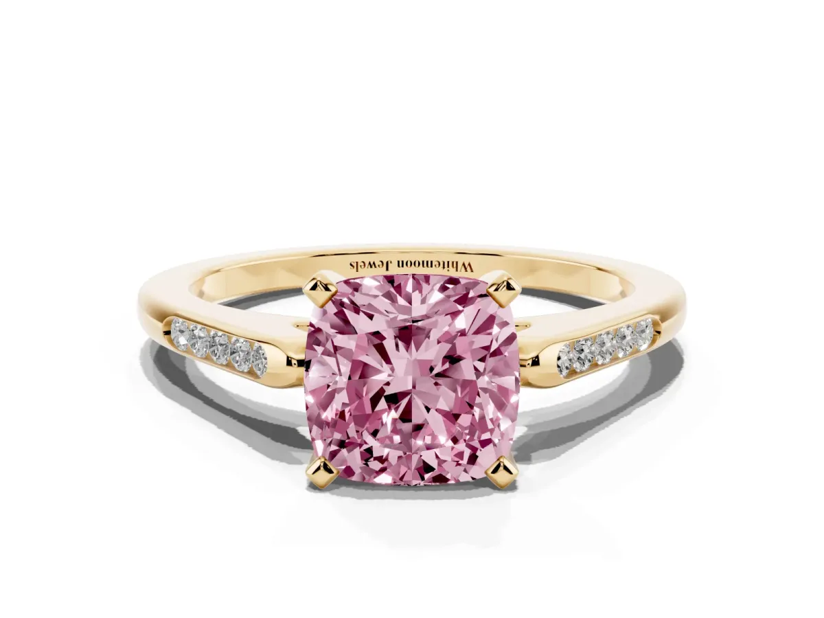 Fancy Pink Cushion Cut Diamond Solitaire Ring with Channel Set Round Band and Prong Setting Yellow gold