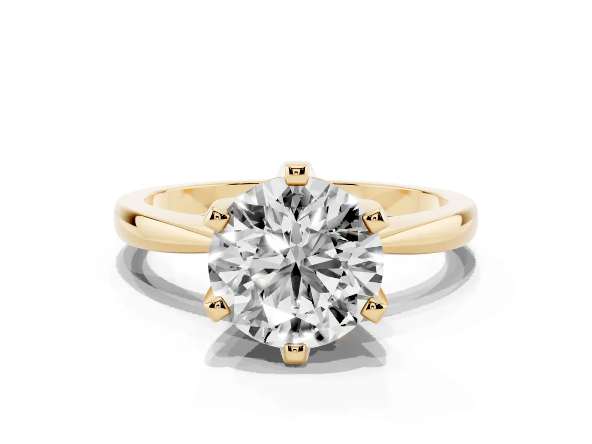 Round Cut Solitaire Engagement Ring with Six-Prong Setting and Tapered Band Yellow gold