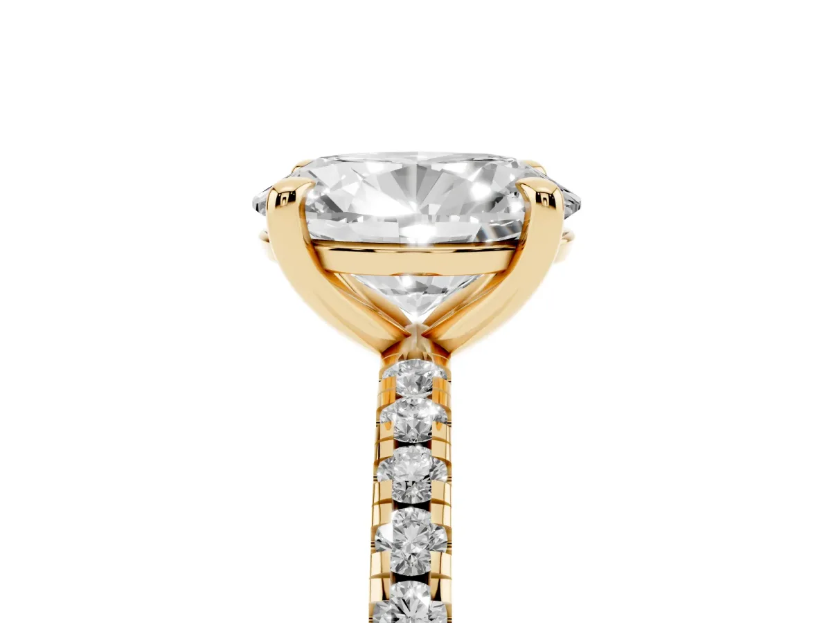 Oval Cut Diamond Brilliant Solitaire Ring with Pavé Band and Four-Prong Setting Yellow gold
