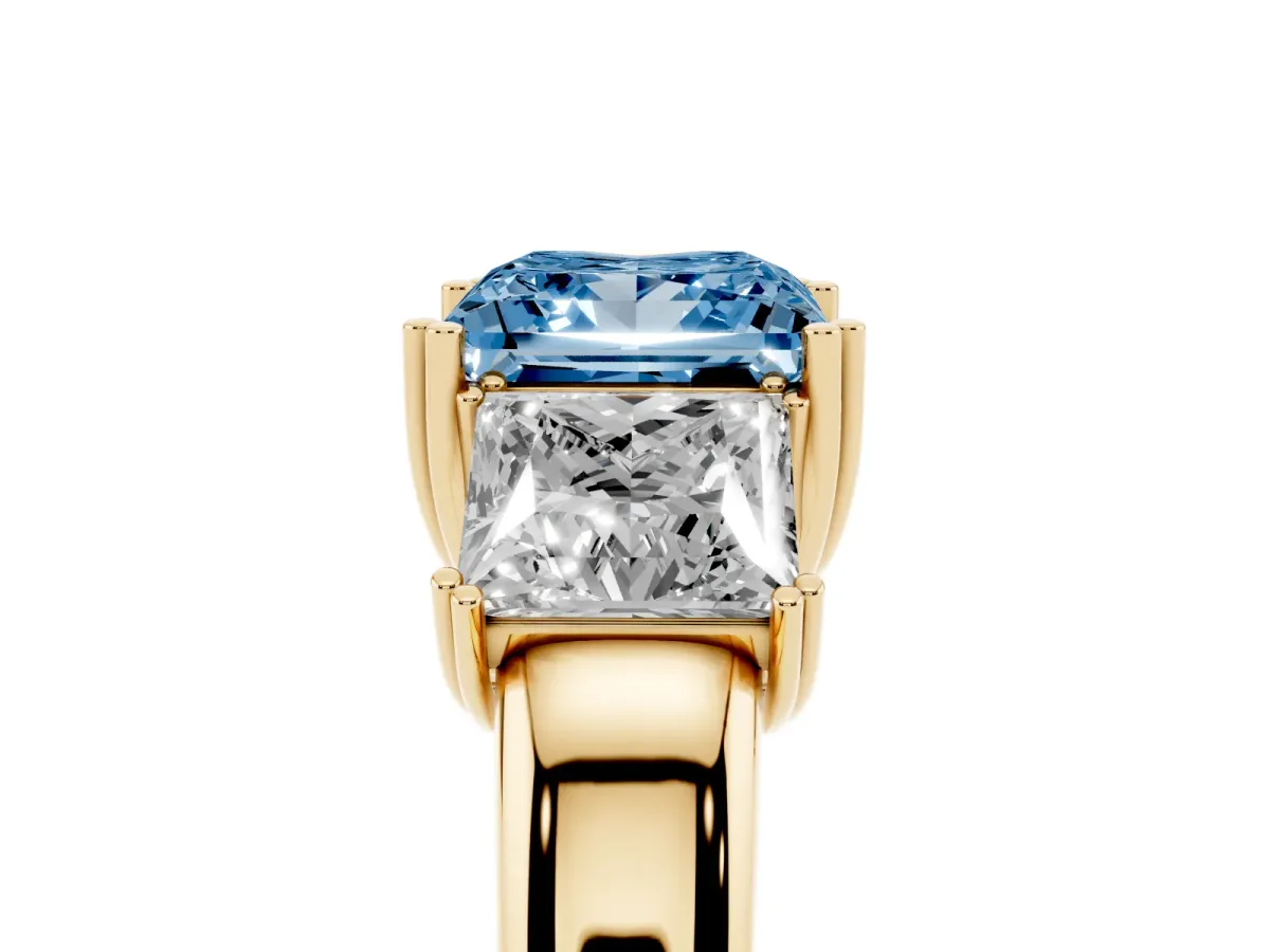 Fancy Blue Three-Stone Princess Cut Cut Diamond Ring with Channel Set Band and Four-Prong Setting Yellow gold