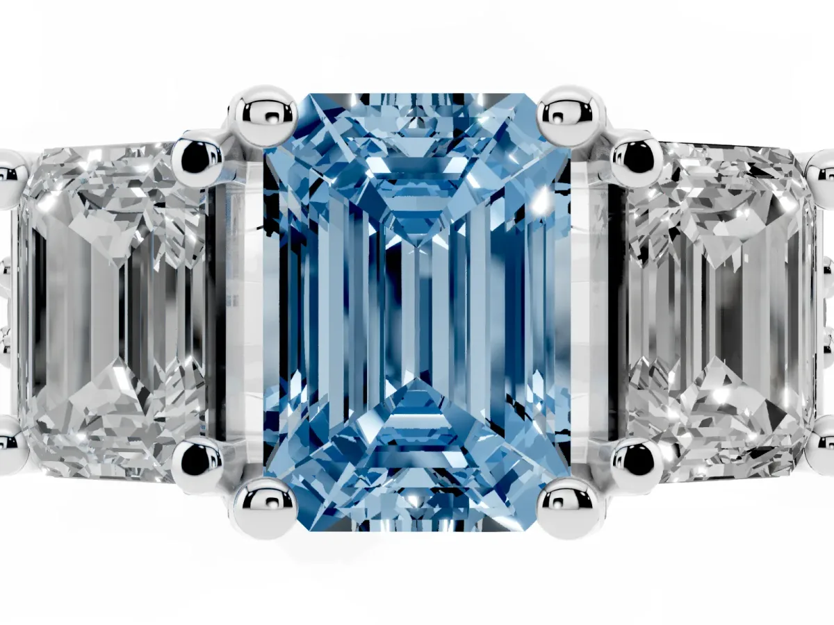 Fancy Blue Emerald Cut Diamond Three-Stone Ring with Channel Set Band and Four-Prong Setting Silver