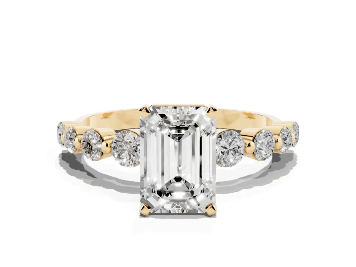 Emerald Cut Solitaire Diamond Ring with Pave Band and Four-Prong Setting Yellow gold