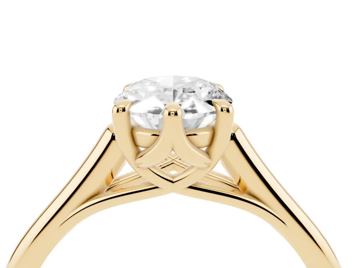 Oval Cut Solitaire Engagement Ring with Six-Prong Setting and Classic Band Yellow gold