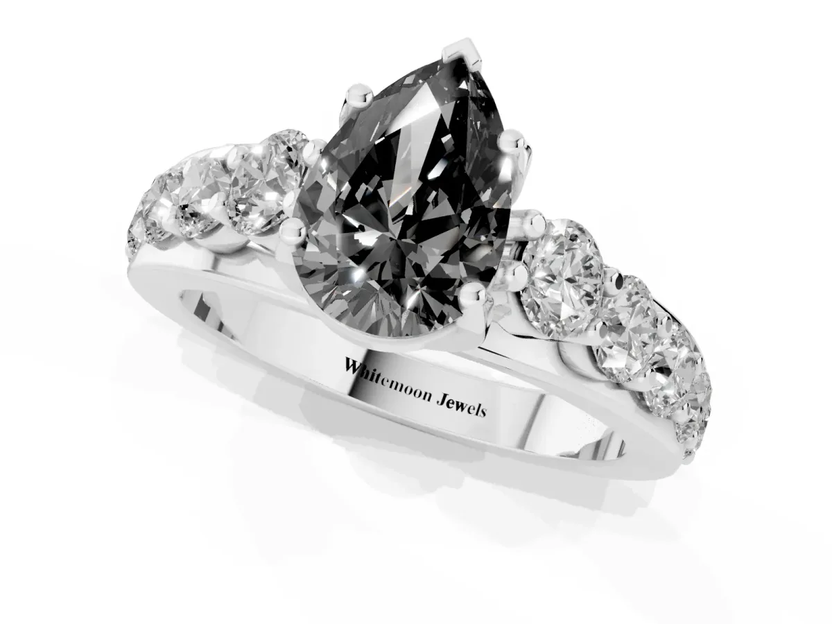 Fancy Black Pear Cut Diamond Engagement Ring with Pavé Band and Four-Prong Setting Silver