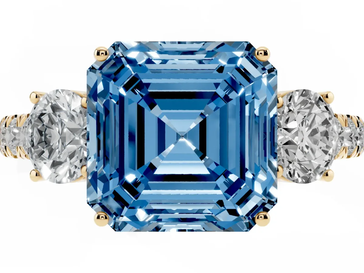 Fancy Blue Asscher Cut Cut Diamond Three-Stone Ring with Round Side Stones and Pavé Band Yellow gold