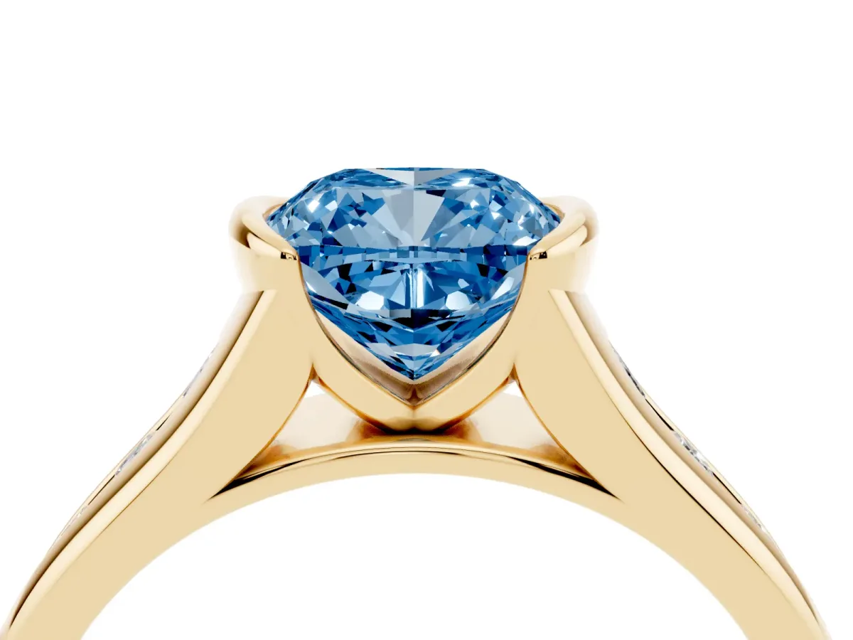 Fancy Blue Cushion Cut Solitaire Bezel-Set Diamond Ring with Channel-Set Band Yellow gold
