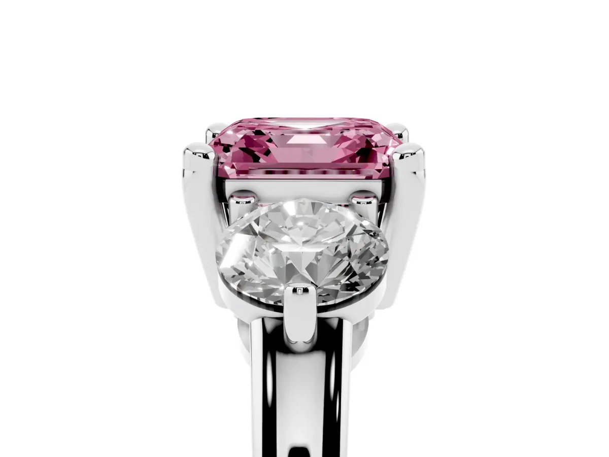 Fancy Pink Three-Stone Asscher Cut Brilliant Cut Solitaire Ring with Prong Setting on a Classic Band Platinum