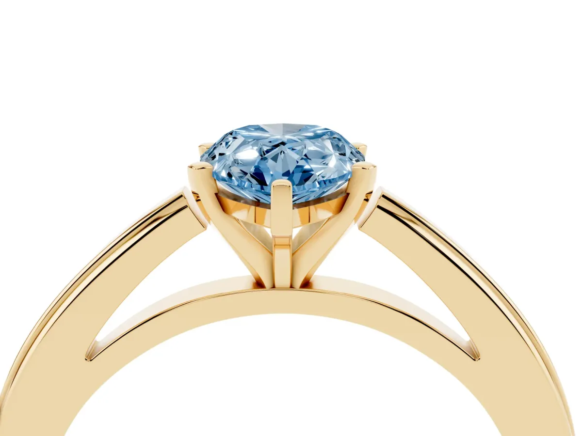 Fancy Blue Pear Cut Solitaire Diamond Ring with Four-Prong Setting and Classic Band Yellow gold