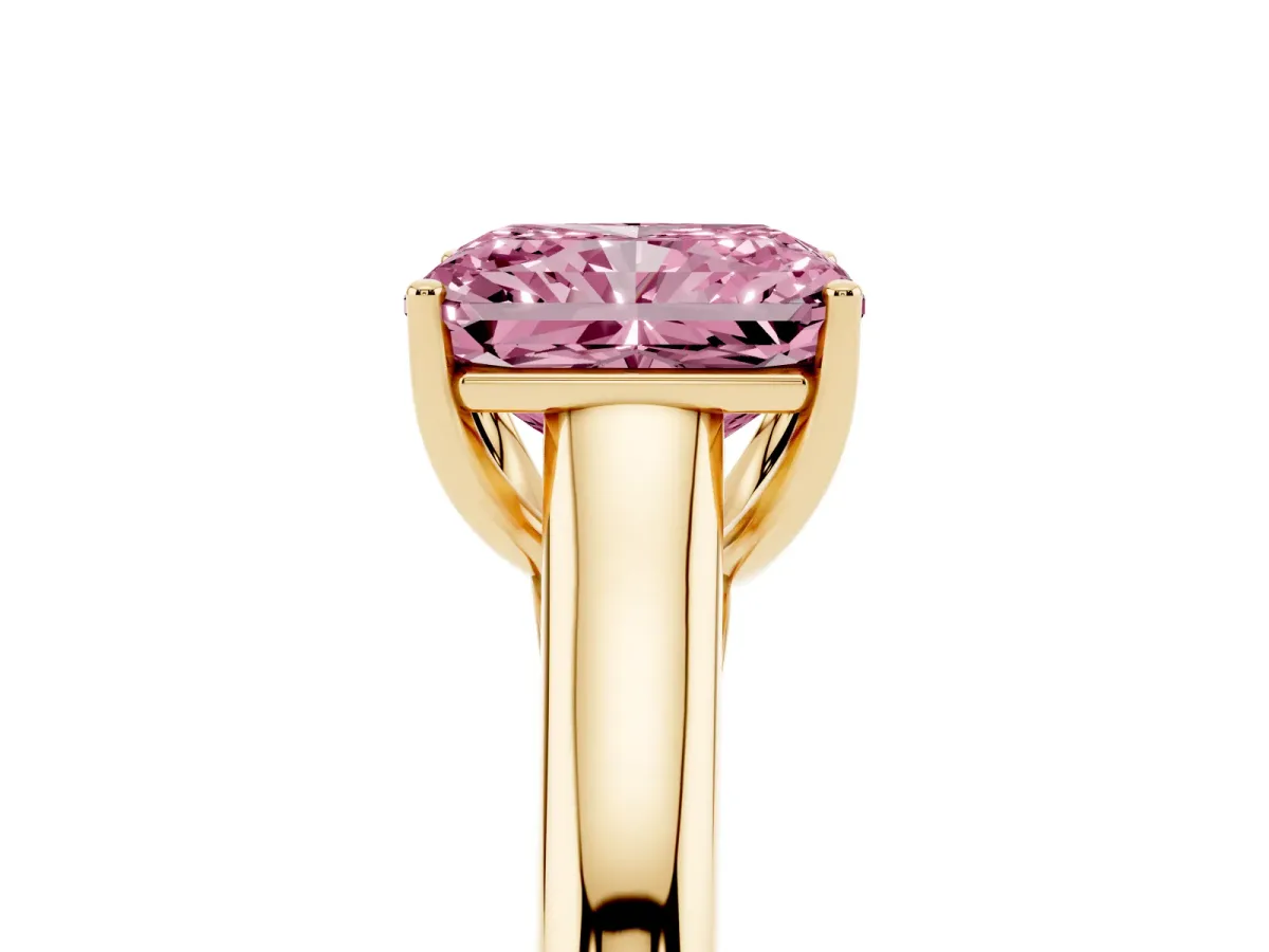 Fancy Pink Radiant Cut Solitaire Engagement Ring with Tapered Band and Four-Prong Setting Yellow gold