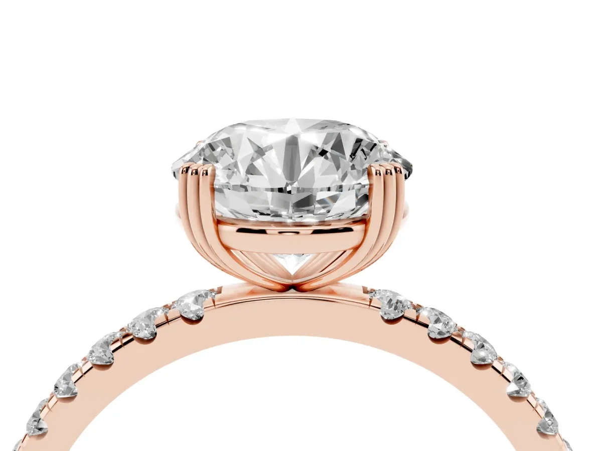 Round Cut Brilliant Solitaire with Pavé Band and Claw Prong Setting Rose gold
