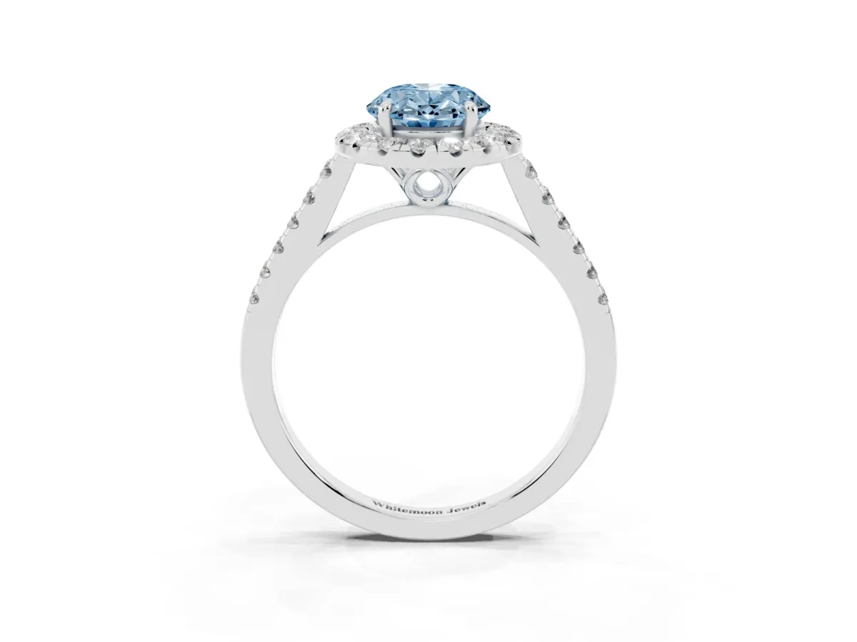 Fancy Blue Oval Cut Halo Pavé Diamond Engagement Ring with Four-Prong Setting Silver