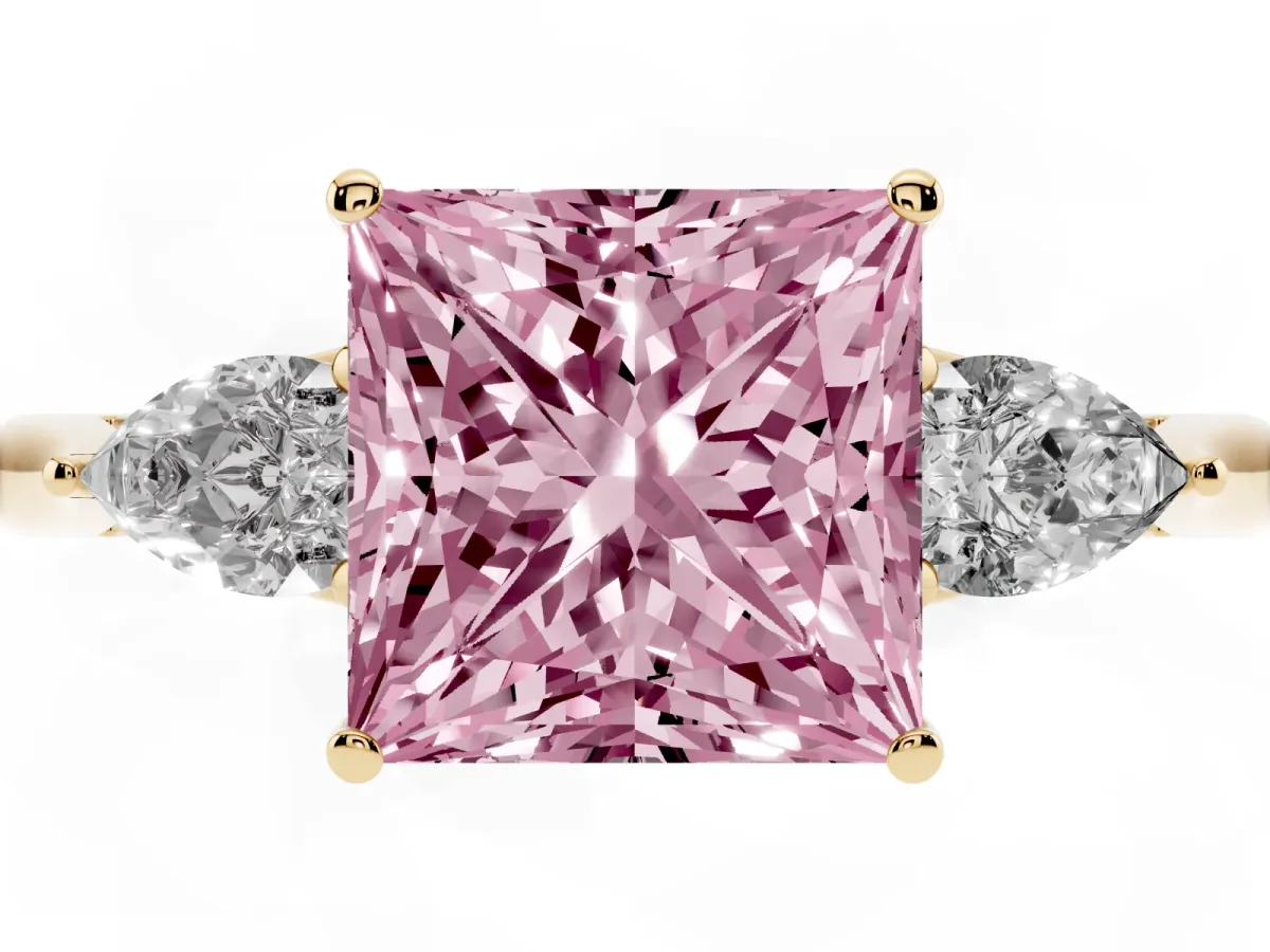 Fancy Pink Three-Stone Princess Cut Diamond Ring with Pear Side Stones in Four-Prong Setting Yellow gold