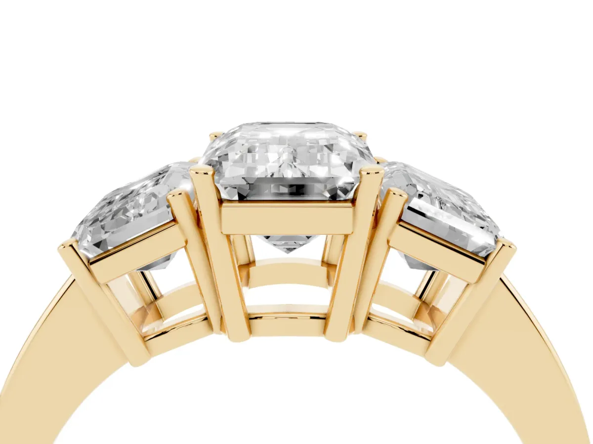Three-Stone Emerald Cut Cut Diamond Engagement Ring with Flat Band and Four-Prong Setting Yellow gold