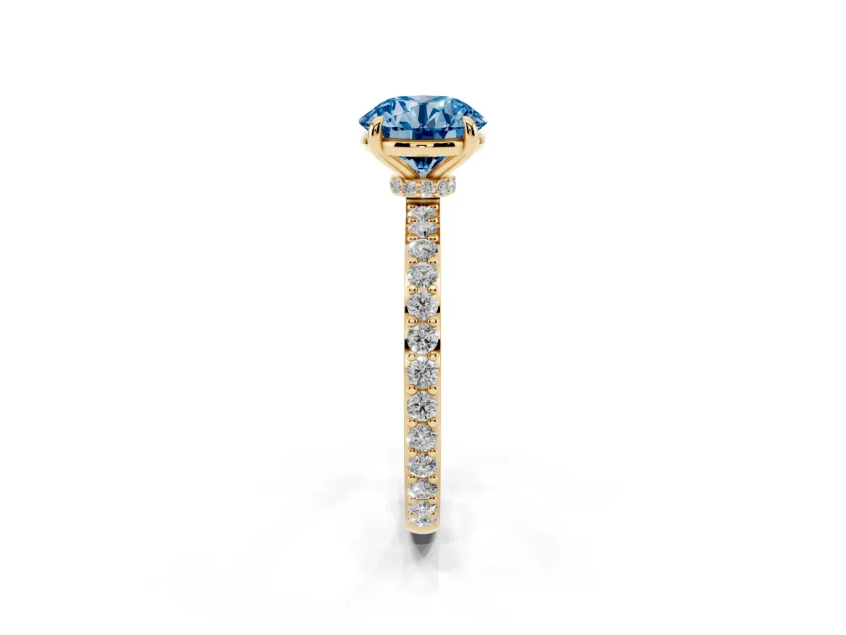 Fancy Blue Round Cut Diamond Pavé Engagement Ring with Round Accents and Prong Setting Yellow gold