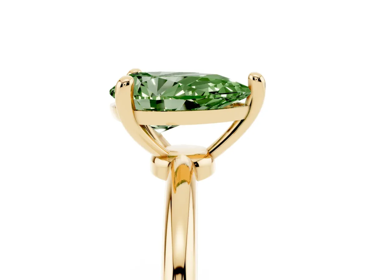 Fancy Green Pear Cut Solitaire Diamond Ring with 4-Prong Setting on a Classic Band Yellow gold