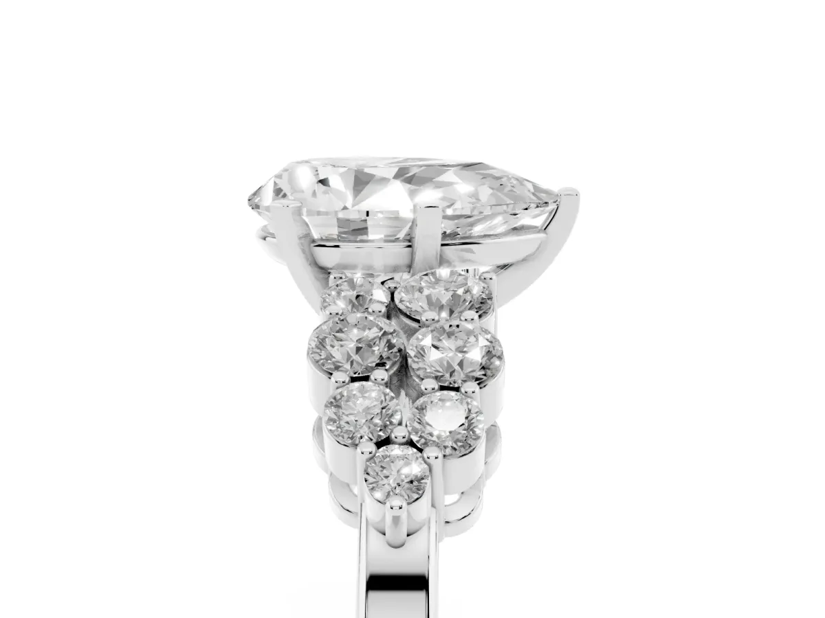 Pear Cut Cluster Diamond Engagement Ring with Pavé Band and Four-Prong Setting Silver